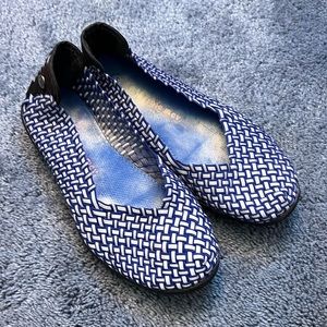 Blue and gray ballet flats